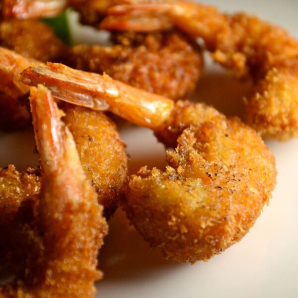 18 Langostinos con Salsa de Ají y Maracuyá